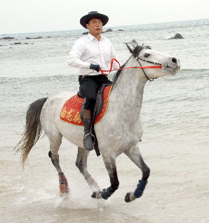 西冲海滩骑马相片